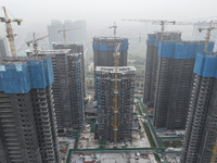 A building under construction by C&D Group is in Nanjing, China, on November 15, 2024. On November 15, 2024, the National Bureau of Statisti...