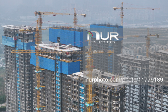 A building under construction by C&D Group is in Nanjing, China, on November 15, 2024. On November 15, 2024, the National Bureau of Statisti...