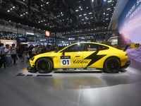 Visitors view a Xiaomi SU7 Ultra new energy vehicle at the 2024 Guangzhou Auto Show in Guangzhou, China, on November 15, 2024. (