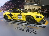 Visitors view a Xiaomi SU7 Ultra new energy vehicle at the 2024 Guangzhou Auto Show in Guangzhou, China, on November 15, 2024. (