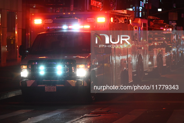 FDNY firefighters respond to a commercial high-rise fire on West 48th Street in Manhattan, New York, United States, on November 15, 2024. Th...