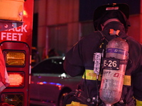 FDNY firefighters respond to a commercial high-rise fire on West 48th Street in Manhattan, New York, United States, on November 15, 2024. Th...