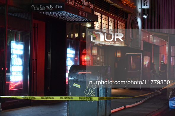 FDNY firefighters respond to a commercial high-rise fire on West 48th Street in Manhattan, New York, United States, on November 15, 2024. Th...