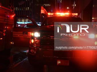 FDNY firefighters respond to a commercial high-rise fire on West 48th Street in Manhattan, New York, United States, on November 15, 2024. Th...