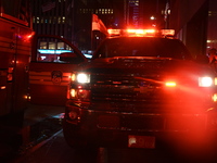 FDNY firefighters respond to a commercial high-rise fire on West 48th Street in Manhattan, New York, United States, on November 15, 2024. Th...