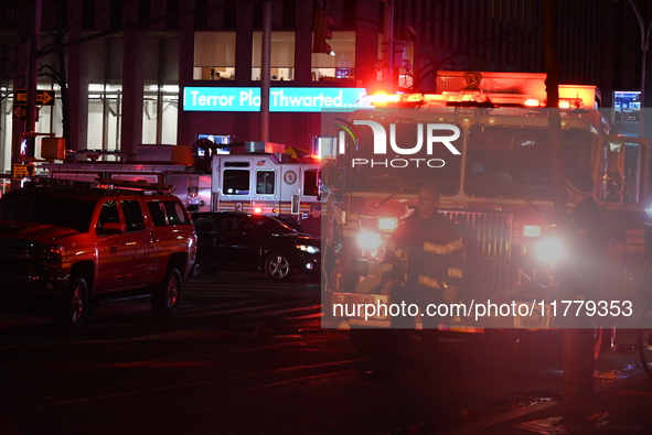 FDNY firefighters respond to a commercial high-rise fire on West 48th Street in Manhattan, New York, United States, on November 15, 2024. Th...