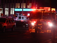 FDNY firefighters respond to a commercial high-rise fire on West 48th Street in Manhattan, New York, United States, on November 15, 2024. Th...