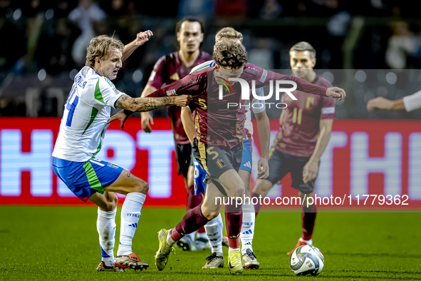 Italy defender Matteo Gabbia and Belgium midfielder Maxim de Cuyper participate in the match between Belgium and Italy at the King Baudouin...