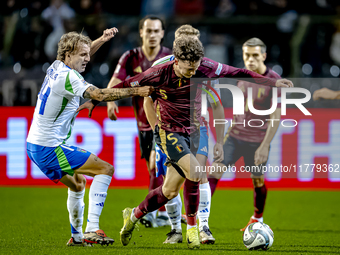 Italy defender Matteo Gabbia and Belgium midfielder Maxim de Cuyper participate in the match between Belgium and Italy at the King Baudouin...