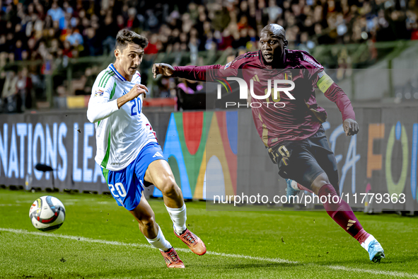 Italy defender Andrea Cambiaso and Belgium forward Romelu Lukaku play during the match between Belgium and Italy at the King Baudouin Stadiu...