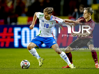 Italy midfielder Nicolo Barella and Belgium midfielder Leandro Trossard play during the match between Belgium and Italy at the King Baudouin...