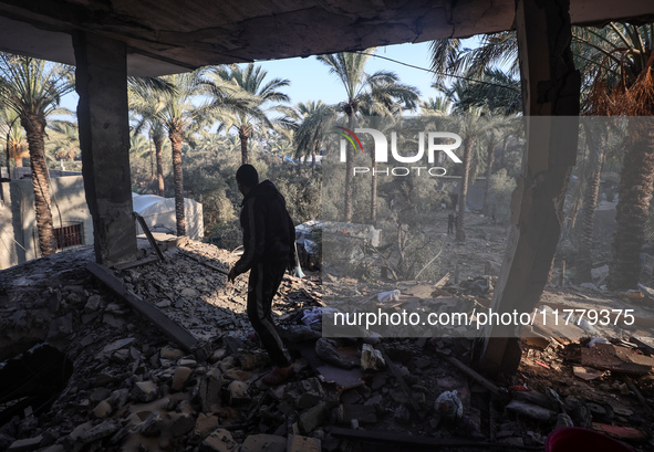 A Palestinian man inspects the site of an Israeli strike on a house in Deir Al-Balah in the central Gaza Strip on November 15, 2024. 