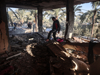 A Palestinian man inspects the site of an Israeli strike on a house in Deir Al-Balah in the central Gaza Strip on November 15, 2024. (