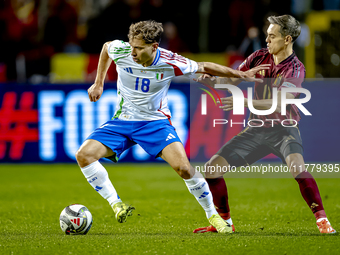 Italy midfielder Nicolo Barella and Belgium midfielder Leandro Trossard play during the match between Belgium and Italy at the King Baudouin...