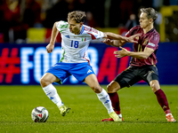 Italy midfielder Nicolo Barella and Belgium midfielder Leandro Trossard play during the match between Belgium and Italy at the King Baudouin...