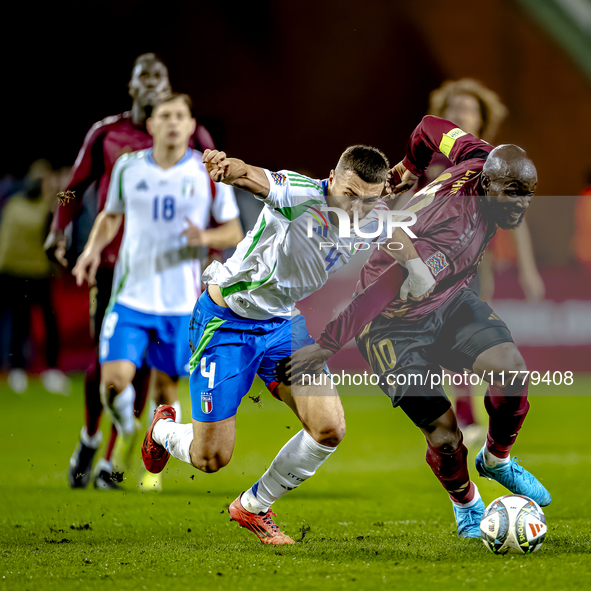 Italy defender Alessandro Buongiorno and Belgium forward Romelu Lukaku play during the match between Belgium and Italy at the King Baudouin...