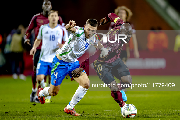 Italy defender Alessandro Buongiorno and Belgium forward Romelu Lukaku play during the match between Belgium and Italy at the King Baudouin...