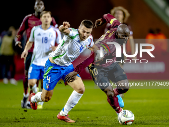 Italy defender Alessandro Buongiorno and Belgium forward Romelu Lukaku play during the match between Belgium and Italy at the King Baudouin...