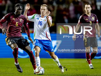 Belgium midfielder Amadou Onana and Italy midfielder Davide Frattesi play during the match between Belgium and Italy at the King Baudouin St...