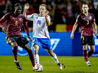 Belgium midfielder Amadou Onana and Italy midfielder Davide Frattesi play during the match between Belgium and Italy at the King Baudouin St...