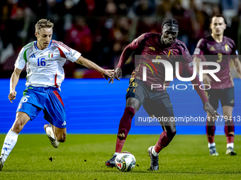 Belgium midfielder Amadou Onana and Italy midfielder Davide Frattesi play during the match between Belgium and Italy at the King Baudouin St...