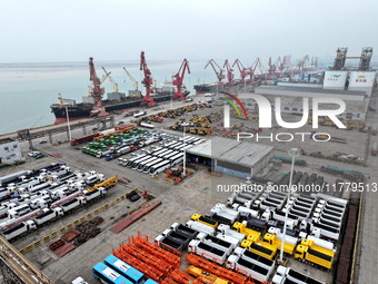 A large number of vehicles and machinery are ready for loading at the dock of the Oriental Port Branch of Lianyungang Port in East China's J...