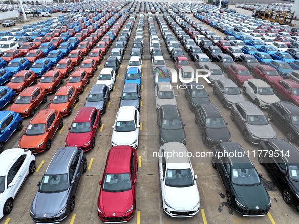 A large number of vehicles gather for loading at the port of East Port Branch in Lianyungang Port in East China's Jiangsu province on Novemb...