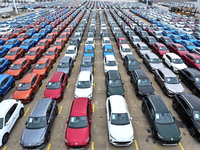 A large number of vehicles gather for loading at the port of East Port Branch in Lianyungang Port in East China's Jiangsu province on Novemb...