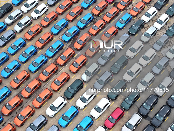 A large number of vehicles gather for loading at the port of East Port Branch in Lianyungang Port in East China's Jiangsu province on Novemb...