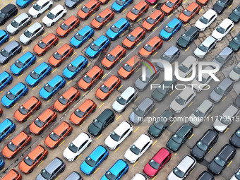 A large number of vehicles gather for loading at the port of East Port Branch in Lianyungang Port in East China's Jiangsu province on Novemb...