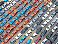 A large number of vehicles gather for loading at the port of East Port Branch in Lianyungang Port in East China's Jiangsu province on Novemb...