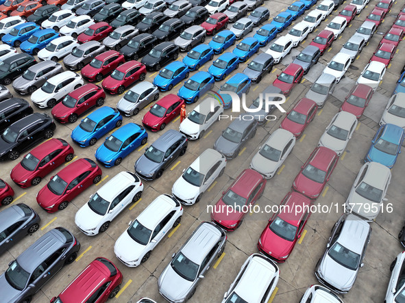 A large number of vehicles gather for loading at the port of East Port Branch in Lianyungang Port in East China's Jiangsu province on Novemb...