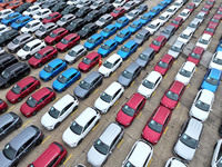 A large number of vehicles gather for loading at the port of East Port Branch in Lianyungang Port in East China's Jiangsu province on Novemb...