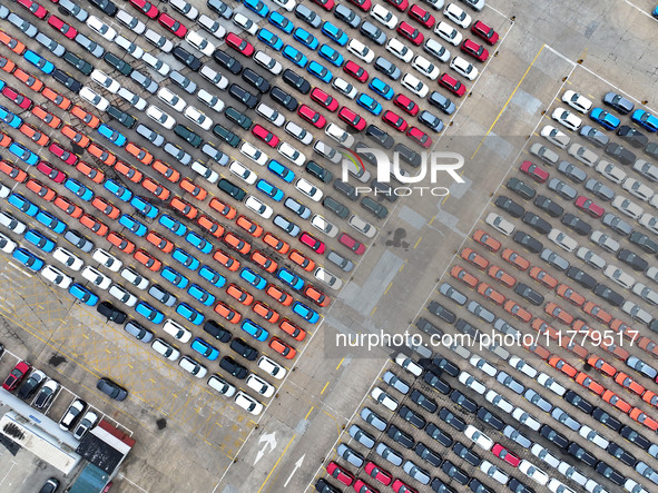 A large number of vehicles gather for loading at the port of East Port Branch in Lianyungang Port in East China's Jiangsu province on Novemb...