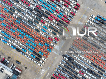 A large number of vehicles gather for loading at the port of East Port Branch in Lianyungang Port in East China's Jiangsu province on Novemb...