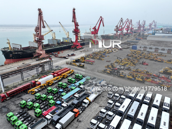 A large number of vehicles and machinery are ready for loading at the dock of the Oriental Port Branch of Lianyungang Port in East China's J...