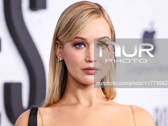 Jennifer Lawrence arrives at the Los Angeles Premiere Of Apple Original Films' 'Bread And Roses' held at the Hammer Museum on November 14, 2...