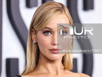 Jennifer Lawrence arrives at the Los Angeles Premiere Of Apple Original Films' 'Bread And Roses' held at the Hammer Museum on November 14, 2...