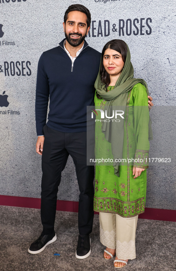 Asser Malik and wife Malala Yousafzai arrive at the Los Angeles Premiere Of Apple Original Films' 'Bread And Roses' held at the Hammer Museu...