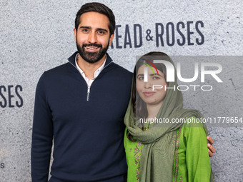 Asser Malik and wife Malala Yousafzai arrive at the Los Angeles Premiere Of Apple Original Films' 'Bread And Roses' held at the Hammer Museu...