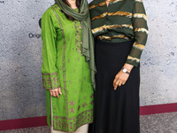 Malala Yousafzai and Sahra Mani arrive at the Los Angeles Premiere Of Apple Original Films' 'Bread And Roses' held at the Hammer Museum on N...