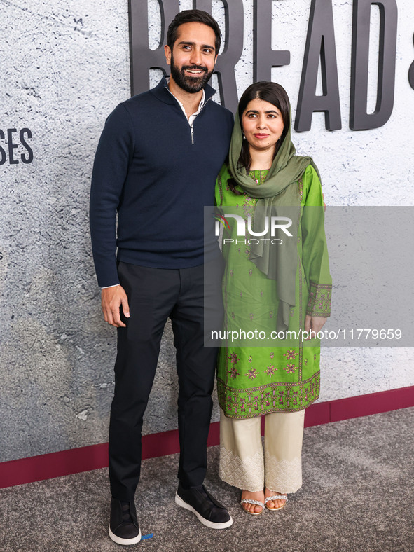 Asser Malik and wife Malala Yousafzai arrive at the Los Angeles Premiere Of Apple Original Films' 'Bread And Roses' held at the Hammer Museu...