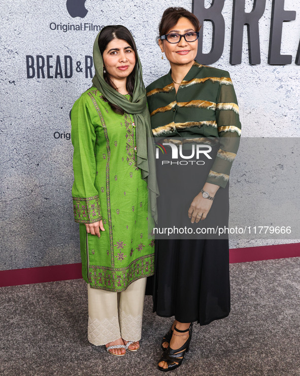 Malala Yousafzai and Sahra Mani arrive at the Los Angeles Premiere Of Apple Original Films' 'Bread And Roses' held at the Hammer Museum on N...