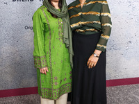 Malala Yousafzai and Sahra Mani arrive at the Los Angeles Premiere Of Apple Original Films' 'Bread And Roses' held at the Hammer Museum on N...