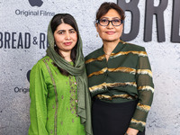 Malala Yousafzai and Sahra Mani arrive at the Los Angeles Premiere Of Apple Original Films' 'Bread And Roses' held at the Hammer Museum on N...