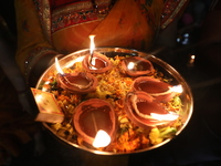 Hindu devotees light oil lamps on the banks of the river Ganges on the occasion of the Hindu religious festival of Dev Deepawali in Kolkata,...