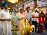 Sikh devotees offer prayers at a Gurudwara on the occasion of Guru Nanak Jayanti in Guwahati, Assam, India, on November 15, 2024. Guru Nanak...