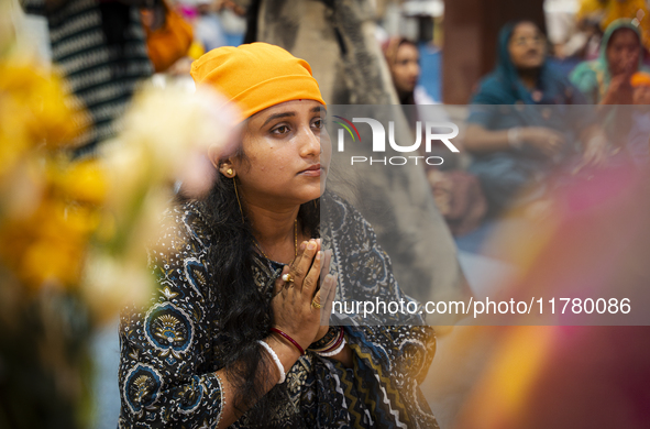 Sikh devotees offer prayers at a Gurudwara on the occasion of Guru Nanak Jayanti in Guwahati, Assam, India, on November 15, 2024. Guru Nanak...