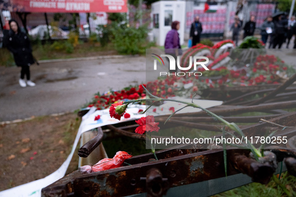 Carnations and wreaths are laid on a monument inside the Athens Polytechnic during the celebration of the 51st anniversary of the Polytechni...