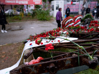 Carnations and wreaths are laid on a monument inside the Athens Polytechnic during the celebration of the 51st anniversary of the Polytechni...